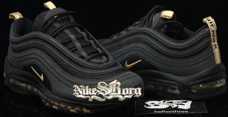 black and gold nike 97
