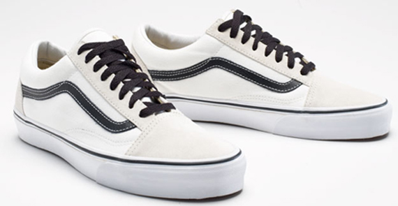 all white vans with black laces