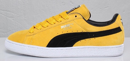 black and yellow puma suede