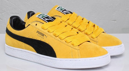 black and yellow puma suede
