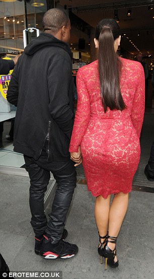 Kanye in the 'Infrared' Air Jordan 6 Alongside Kim Kardashian