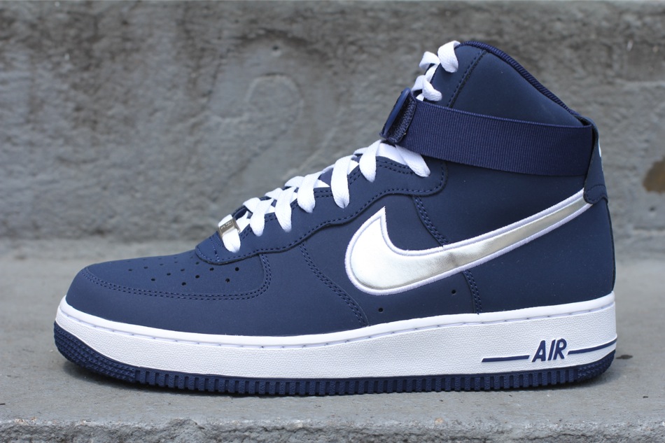 navy blue and white high top air force 1
