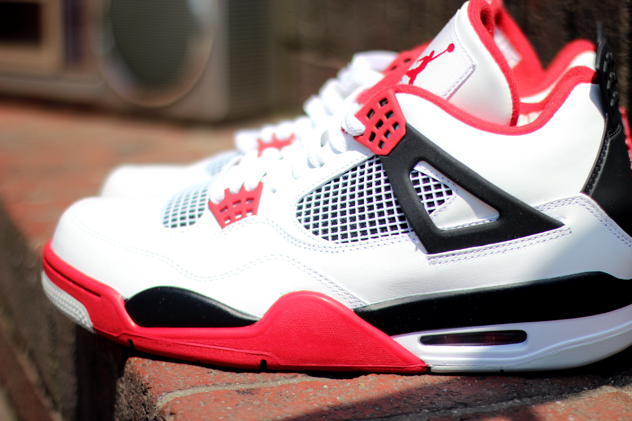 Air Jordan 4 'Fire Red' at Social Status | SneakerFiles