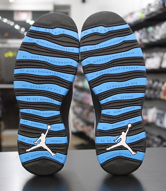 black jordans with blue sole