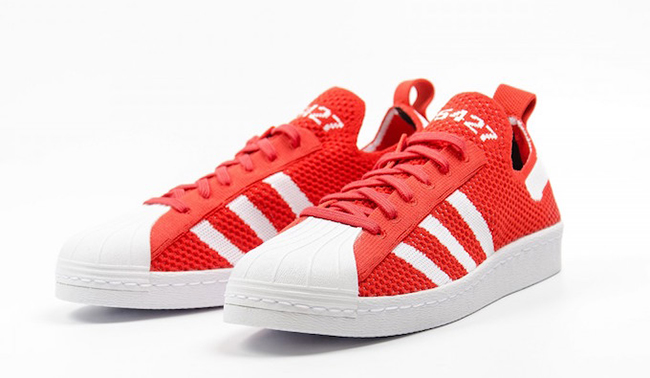 red and white adidas superstar