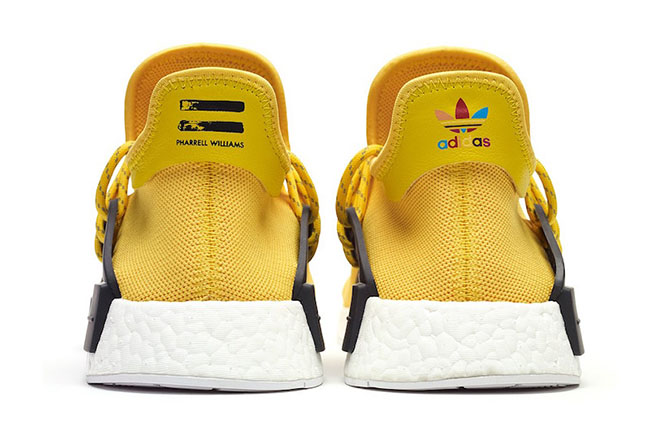adidas yellow human race shoes