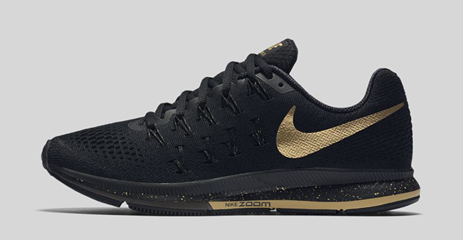black nike shoes with gold