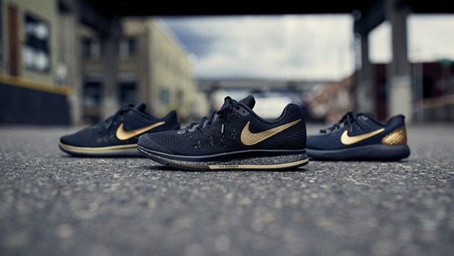 black nike with gold