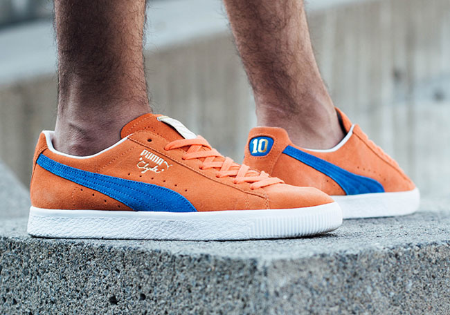 orange and blue puma shoes