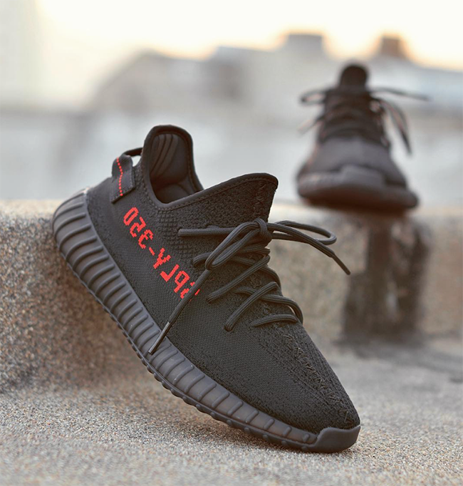 yeezy 350 black with red writing