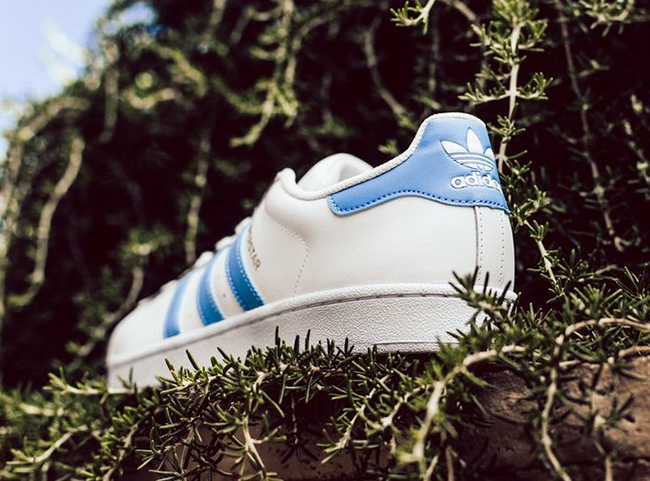 light blue and white adidas