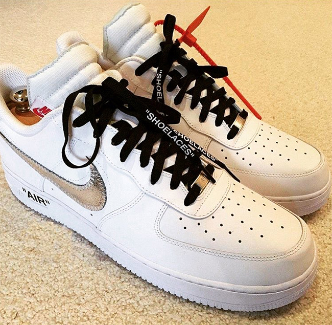 white nike shoes with black laces