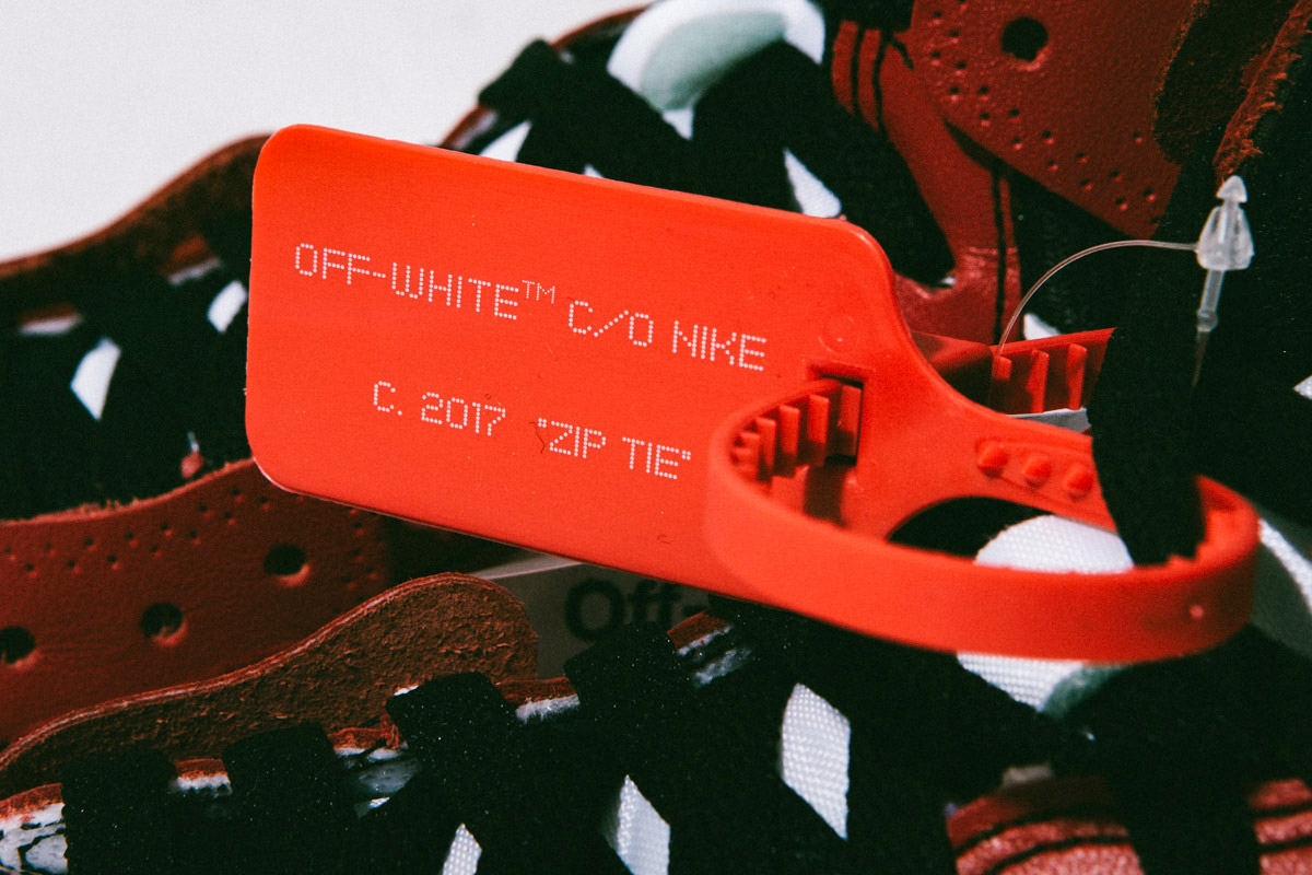 off white sneakers red tag