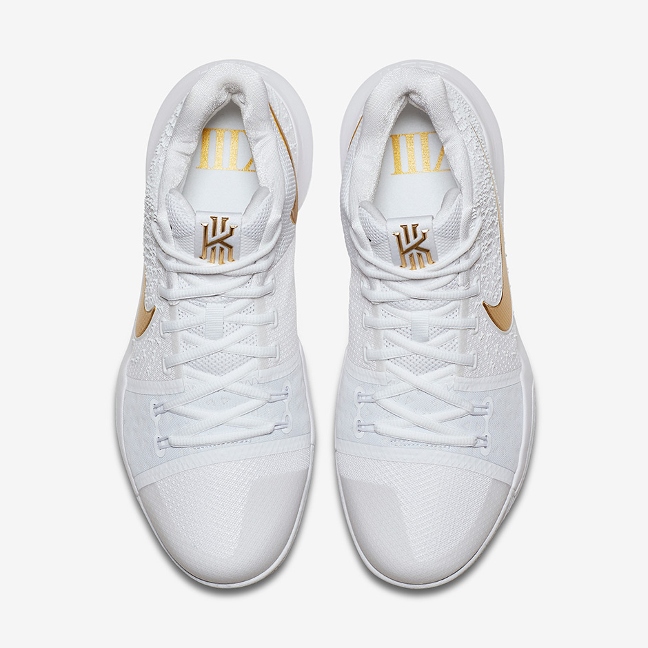 white nike shoes with gold swoosh