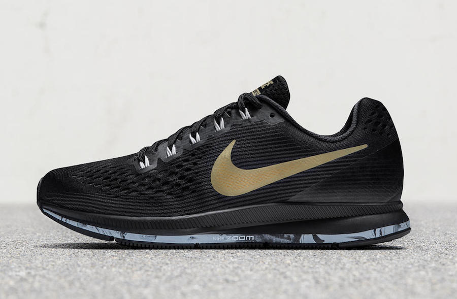 black nikes with gold swoosh