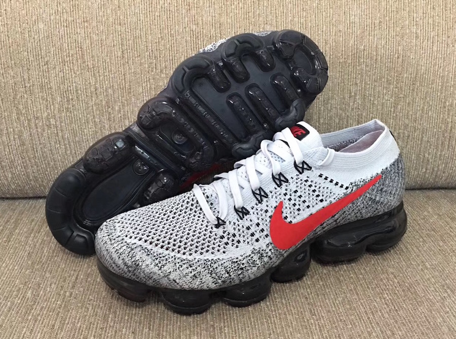 black vapormax with red nike check