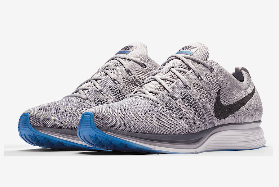 grey and blue nike trainers