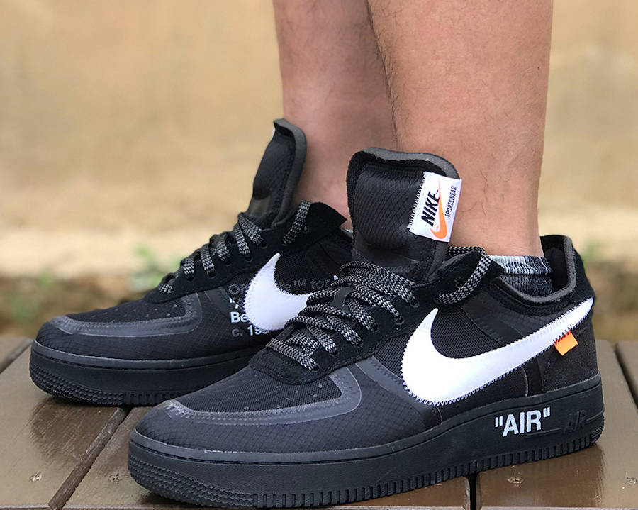 air force 1 low black on feet