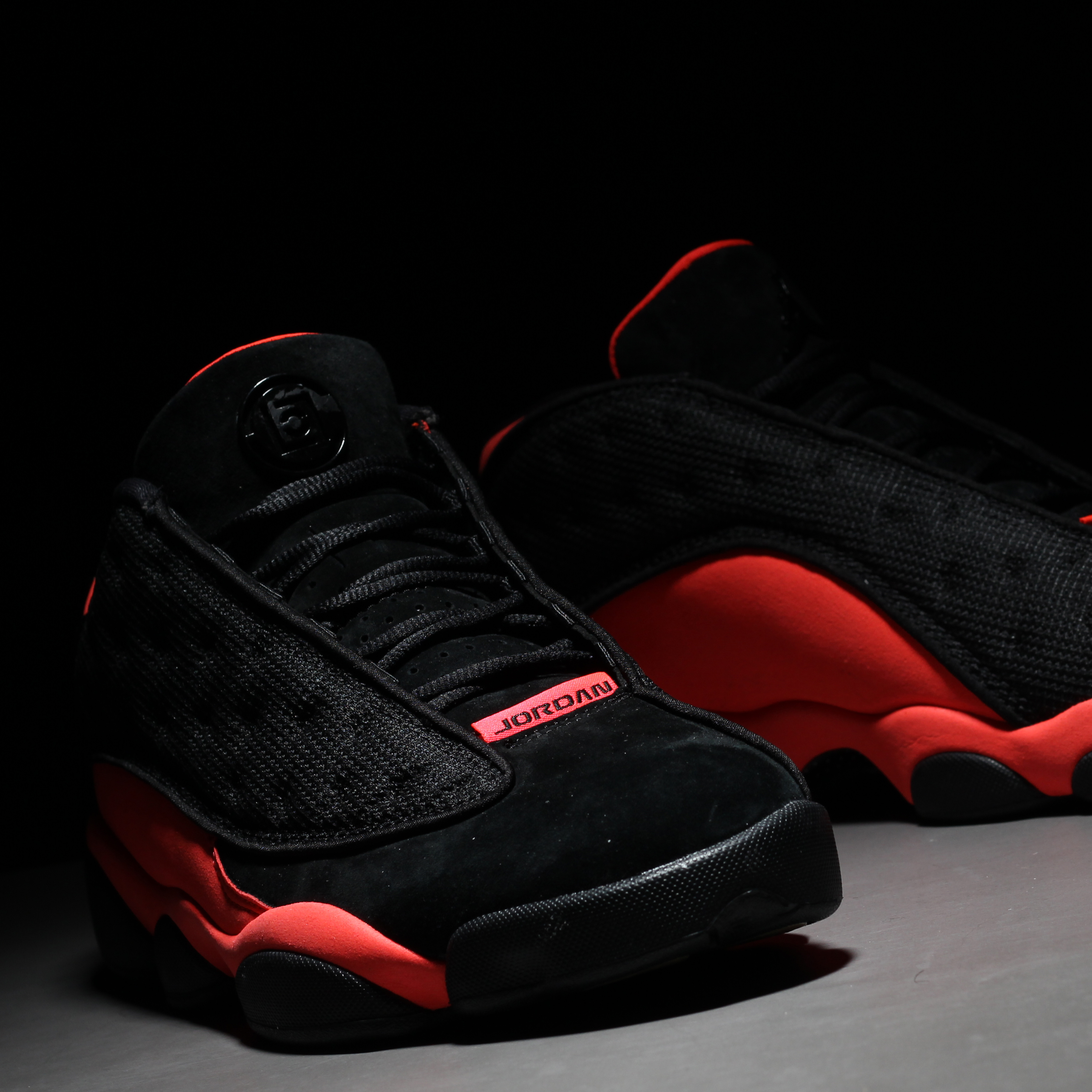 Air Jordan 13 - Black / Infrared •