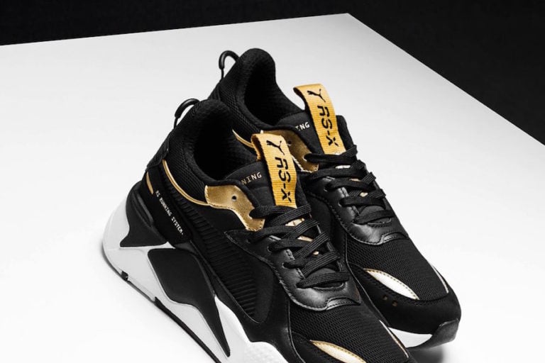 black and gold pumas for men