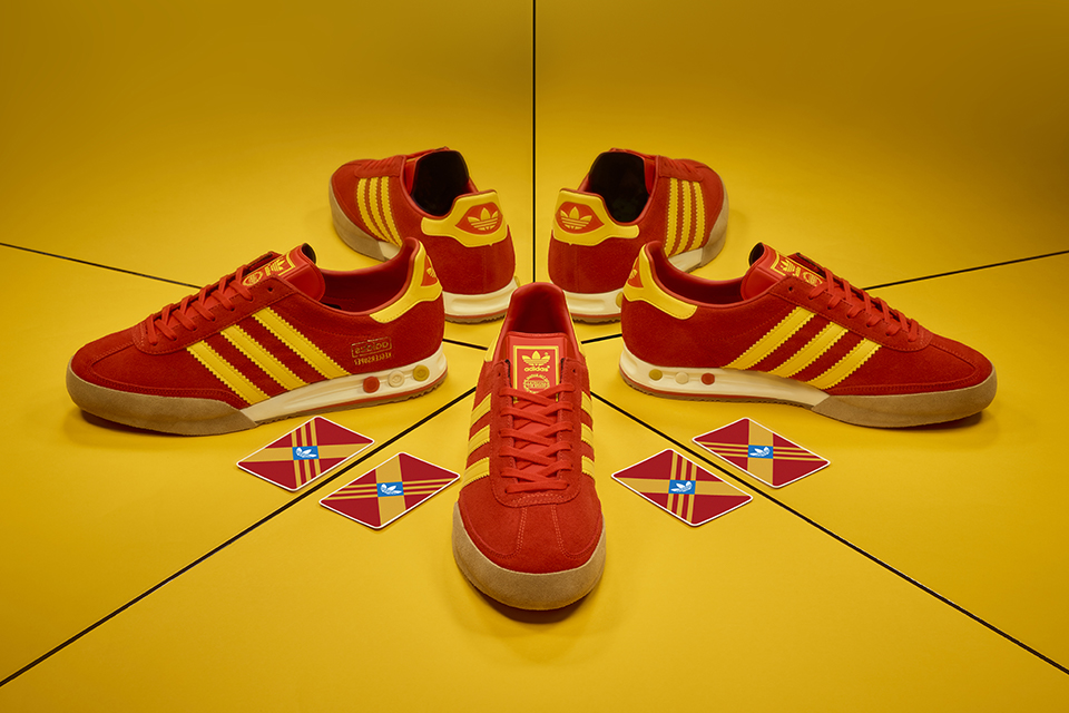 red and yellow adidas shoes