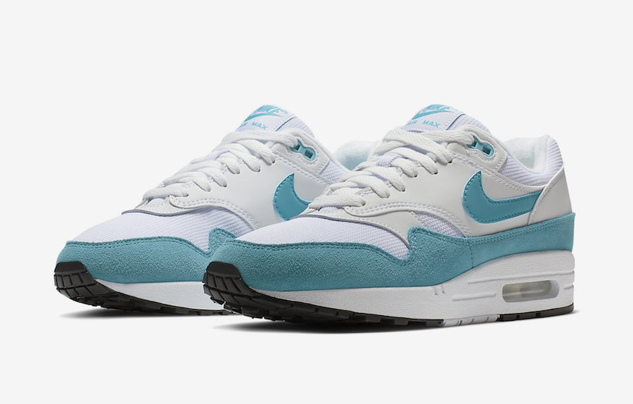 white and turquoise nike shoes