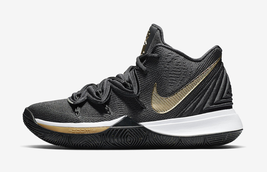 black and yellow kyrie 5