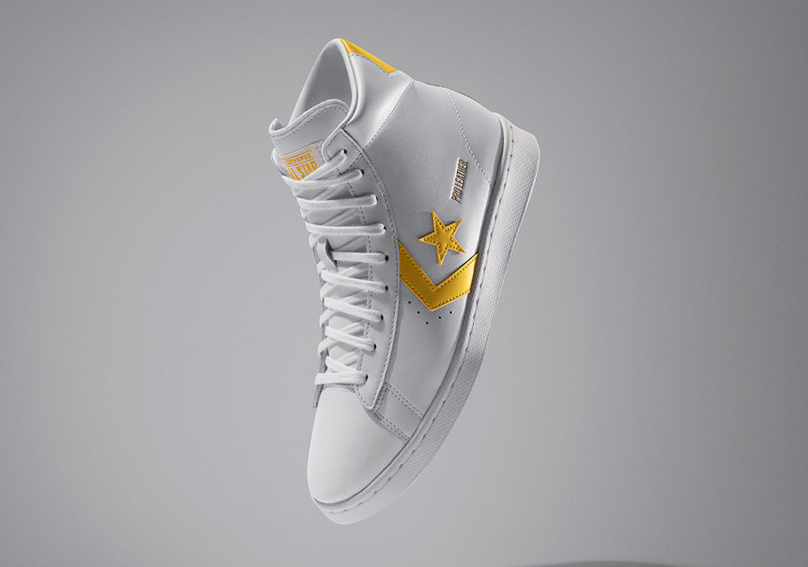 white and yellow converse