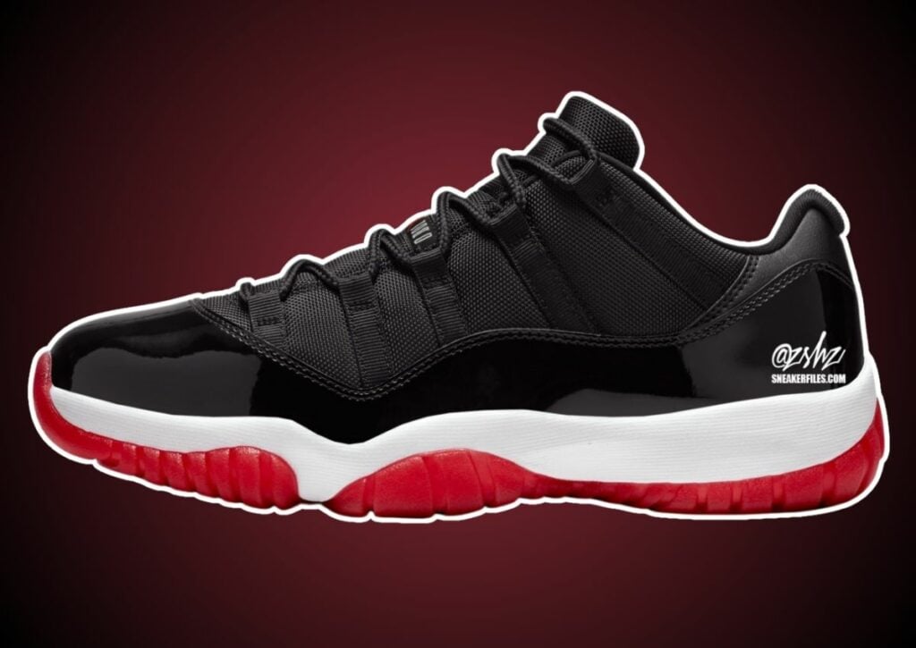 All black jordan 11 with red jumpman on sale