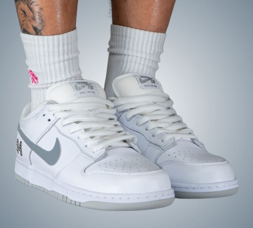 Supreme Nike SB Dunk Low White Metallic Silver HQ8487-100 On-Feet